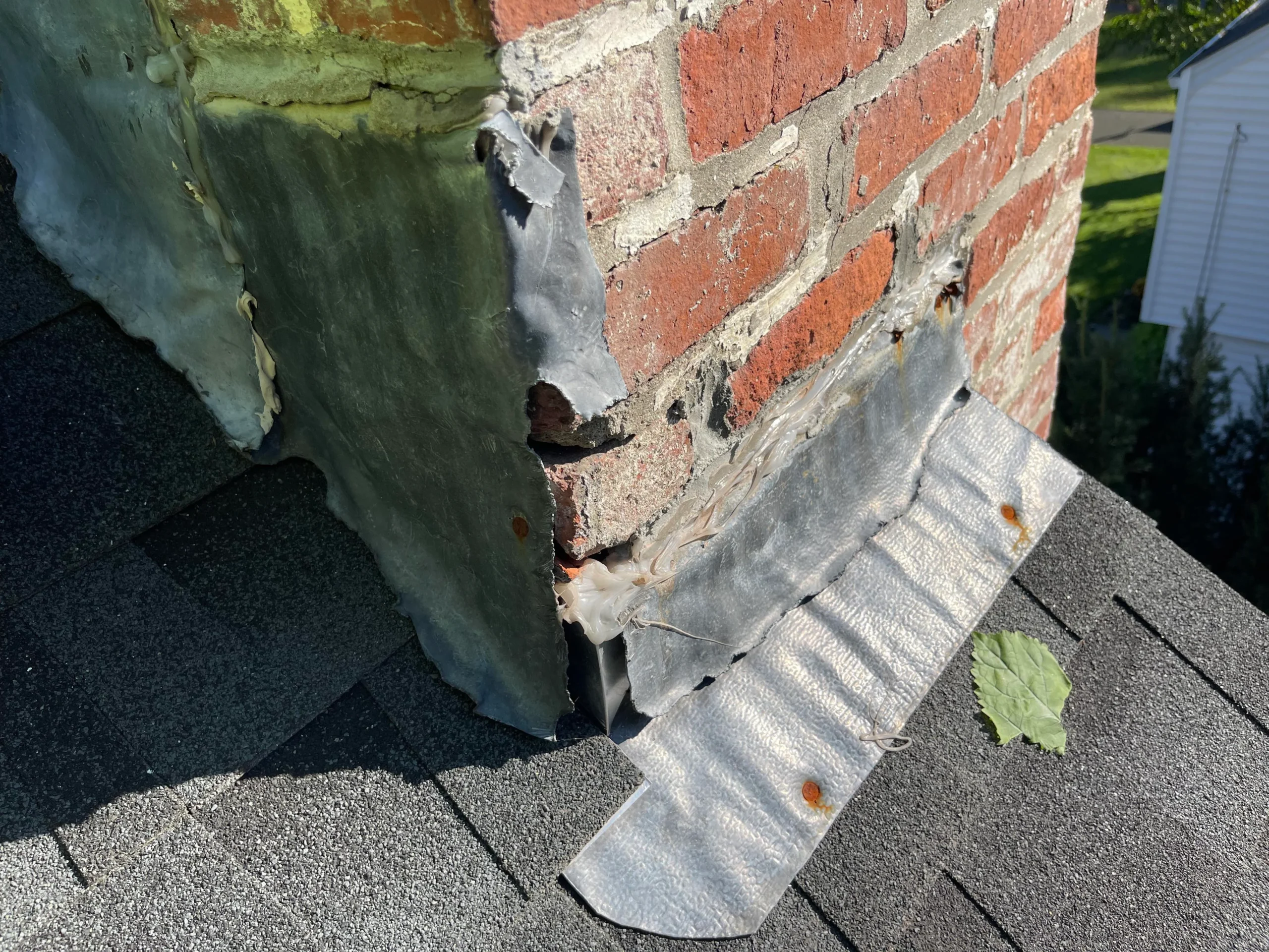 Old chimney flashing that needs replacing.